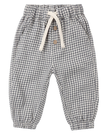 Quincy Mae Baby Boys’ and Boys’ Giovani Pant in gray and white gingham woven gauze featuring an elastic waistband, adjustable drawstring, two wooden buttons, side pockets, and elastic cuffs.