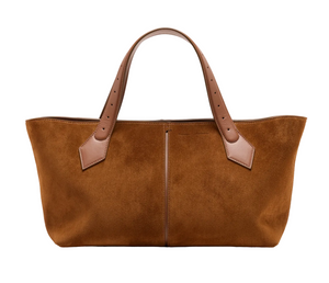 The Proenza Schouler East West Chelsea Tote, featuring brown suede, tan leather handles, and a structured silhouette, is shown against a plain white background.