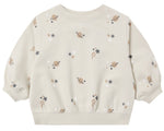 The Quincy Mae Baby Boys’ and Boys’ Oversized Crew Sweatshirt features a neutral beige color with an all-over pattern of planets, stars, and shooting stars in soft shades. Made from cozy fleece, this oversized crewneck pullover showcases the whimsical design across the front, sleeves, and back—making it an ideal layering piece for any adventure.