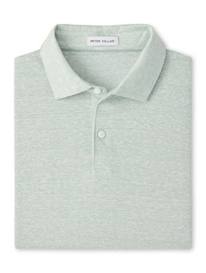The Peter Millar Sanibel Polo is a light green linen-cotton shirt featuring a collar, two buttons, and an inside neck label—crafted from lightweight slub fabric for a casual essential look.
