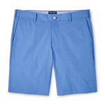 The Peter Millar Surge Performance Short in light blue features belt loops, a front button, zip fly, side pockets, and four-way stretch for comfort. Perfect men's performance apparel, shown laid flat on a white background.