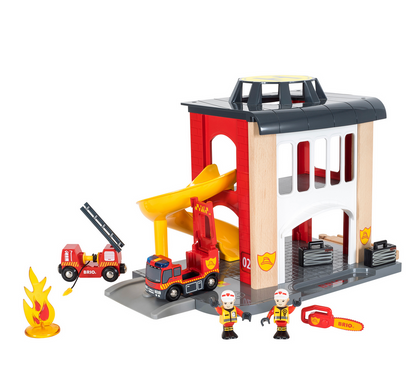 Brio’s Central Fire Station includes a building, two firefighter figures, a fire engine, ladder truck, rescue team accessories, and a yellow slide for endless imaginative play.