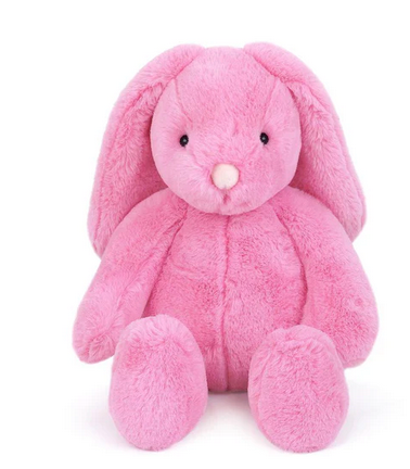 The Mon Ami Blossom Bunny, featuring a soft pink nose and long floppy ears, sits upright against a plain white background, its weighted bottom keeping it steady.