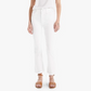 The individual is styled in a white top with chic, high-waisted flare jeans from Mother called "The Hustler Ankle Fray," complemented by tan sandals. The ensemble pops against the plain background, creating a clean and sophisticated look.