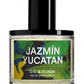 A 50 ml bottle of D.S. & DURGA Jazmin Yucatan eau de parfum, featuring a vibrant floral label and a black cap, encapsulates the essence of jazmín yucateco amid the allure of limestone ruins.