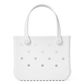 The Bitty Bogg® Bag by Bogg Bags features a white rubber design with circular holes on the front, two sturdy handles, and “bogg” embossed in the bottom right corner. This compact tote is ideal for everyday use and works perfectly as a washable lunch tote.