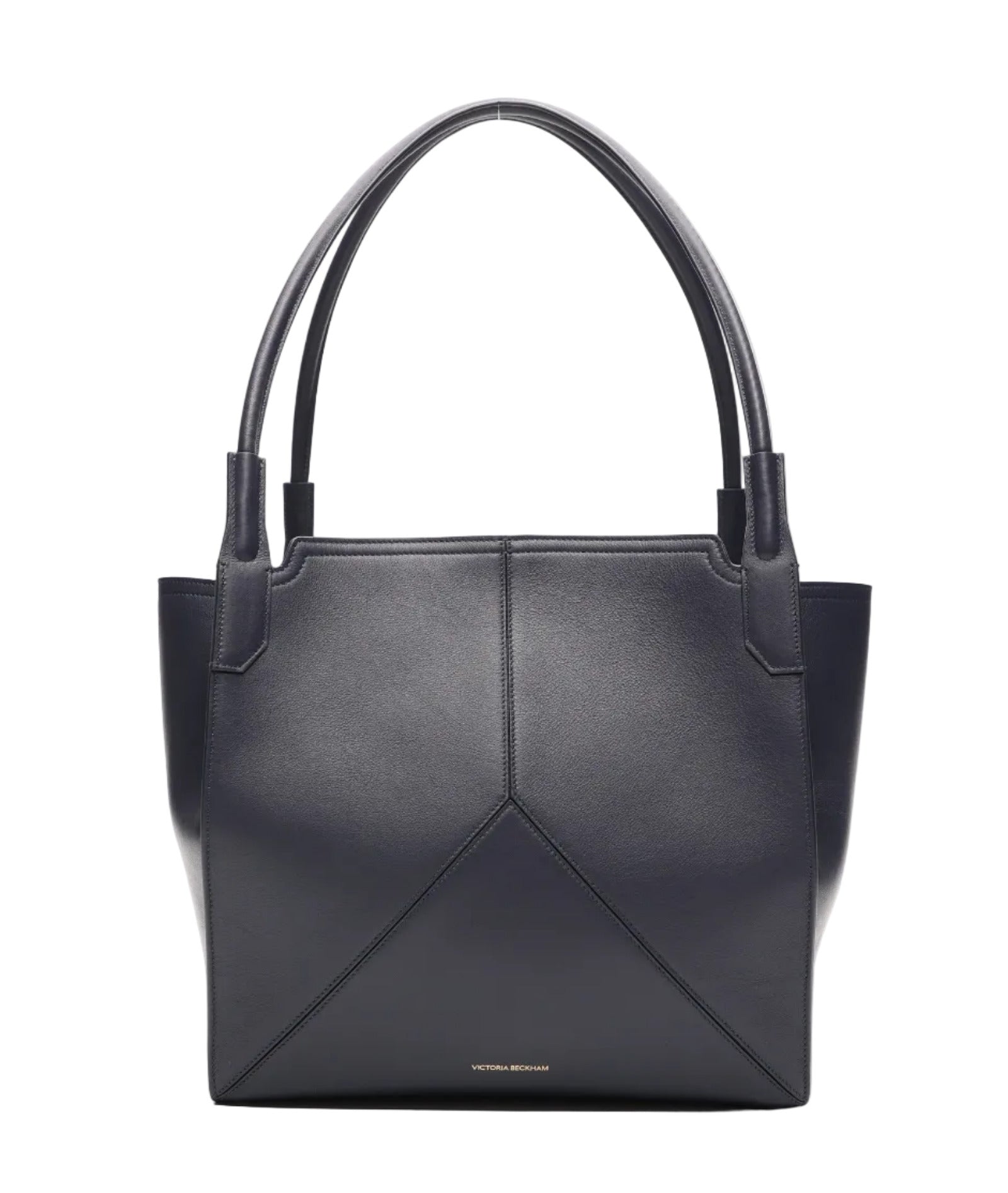A Small Victoria Tote by Victoria Beckham in black smooth calf leather, featuring double handles, geometric stitching, and small gold text near the lower center, shown on a plain white background.