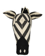 Add a touch of whimsy to your walls with the Fiona Walker Stripe Zebra Head Wall Decoration. This delightful piece, crafted from black and white felt, features a striped pattern and upright ears, making it perfect for celebrating your love of animals.