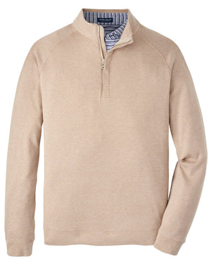 The Peter Millar Grant Birdseye Quarter-Zip is a beige cotton-cashmere blend pullover with long sleeves, a stand collar, and a visible blue and white striped inner lining.
