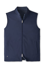A water-resistant, navy blue reversible zip-front Ryder Reversible Vest by Peter Millar.