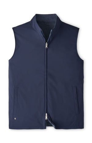 A water-resistant, navy blue reversible zip-front Ryder Reversible Vest by Peter Millar.