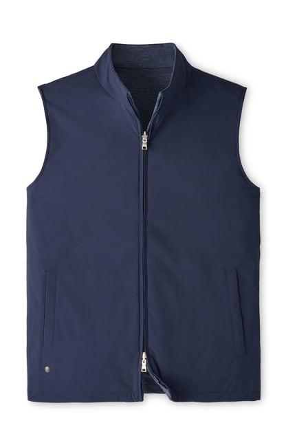 A water-resistant, navy blue reversible zip-front Ryder Reversible Vest by Peter Millar.