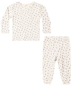 The Quincy Mae Baby Girls’ Pointelle Long Sleeve Tee + Legging set includes a long sleeve top and matching leggings in white pointelle fabric featuring a delicate gray floral pattern.