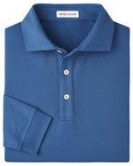 The Peter Millar Lyons Performance Jersey Long-Sleeve Polo is a blue, collared shirt with three buttons and moisture-wicking fabric, designed for comfort and performance.