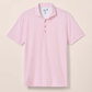 The Johnnie-O Flock Yeah Performance Mesh Polo is a light pink, short-sleeve shirt with a subtle geometric pattern, crafted from performance fabric with a collar and three-button placket—perfect for upgrading your golf wardrobe.