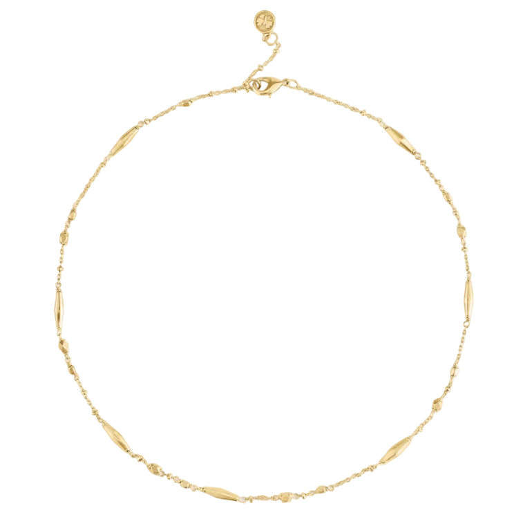 Anabel Aram Milos Multi Beaded Necklace, an 18k gold plated chain with scattered elongated and small spherical beads.