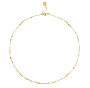 Anabel Aram Milos Multi Beaded Necklace, an 18k gold plated chain with scattered elongated and small spherical beads.