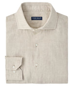 The Astino Lino Sport Shirt by Peter Millar is a beige long-sleeve Italian linen shirt, neatly folded, with a classic collar and mother-of-pearl buttons, featuring the Peter Millar label inside the collar.