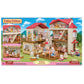 Calico Critters Country Home-Secret Attic Playroom playset featuring animal figurines, including the popular Chocolate Rabbit family, arranged in detailed rooms with furnished accessories; displayed against a pink packaging background with product information and images of the Red Roof Country Home.