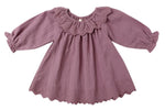 The Quincy Mae Baby Girls' and Girls' Long Sleeve Isla Dress in mauve features a scalloped hem and embroidered details on the collar and bottom edge. Made from soft cotton, it's perfect for stylish comfort.