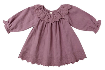 The Quincy Mae Baby Girls' and Girls' Long Sleeve Isla Dress in mauve features a scalloped hem and embroidered details on the collar and bottom edge. Made from soft cotton, it's perfect for stylish comfort.
