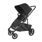 An UPPAbaby Cruz V2 Stroller, in black, showcasing a streamlined design by UPPAbaby with four wheels for improved maneuverability, a collapsible frame, adjustable handlebar, and protective canopy.