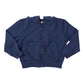 The Kids’ Jax Hoodie by Coop Kids PC—a navy blue French Terry zip-up with long sleeves, two front pockets, and ribbed waistband and cuffs—is shown laid flat on a white background.