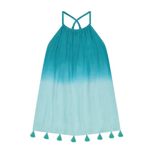 Girls’ Mini Chantal Dress by Mer in a sleeveless teal and light blue gradient design, featuring a strappy back and tassels along the hem, displayed on a white background.
