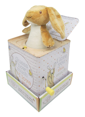 The Kids Preferred Guess How Much I Love You Jack-in-the-Box features a plush Nut-brown Hare that pops out when you turn the yellow crank, with phrases like "Guess how much I love you" on the decorated box.