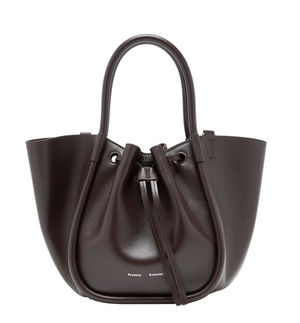 Small Ruched Soft Shiny Tote by Proenza Schouler in dark brown leather, featuring a sculptural silhouette, dual handles, ruched drawstring closure, and small white brand text at the bottom front.