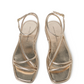 The Loeffler Randall Noor Strappy Ankle Wrap Flat features champagne metallic square toes, thin crisscross straps, and ankle buckles, shown from above.