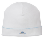 The Kissy Kissy Premier Noah's Ark Hat with Hand Emb. is a plain white Pima cotton baby hat with a folded brim and hand-embroidered blue and yellow boat on the front, part of the Noah's Ark Collection.