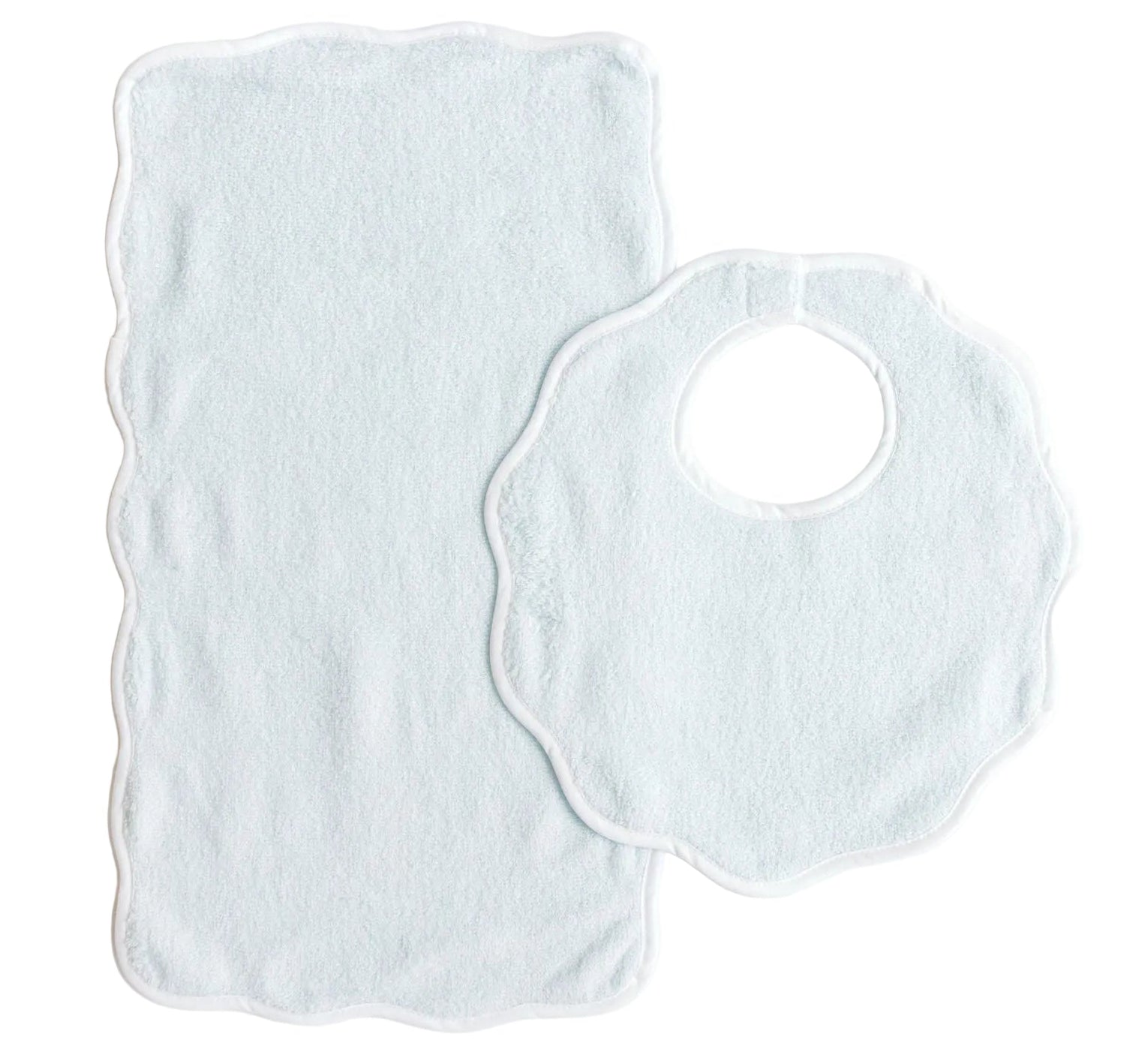 A charming Terry Tots Bib & Burp Set, featuring a white scalloped-edge bib and matching burp cloth, is laid flat on a plain background—perfect for making special feeding moments even sweeter.