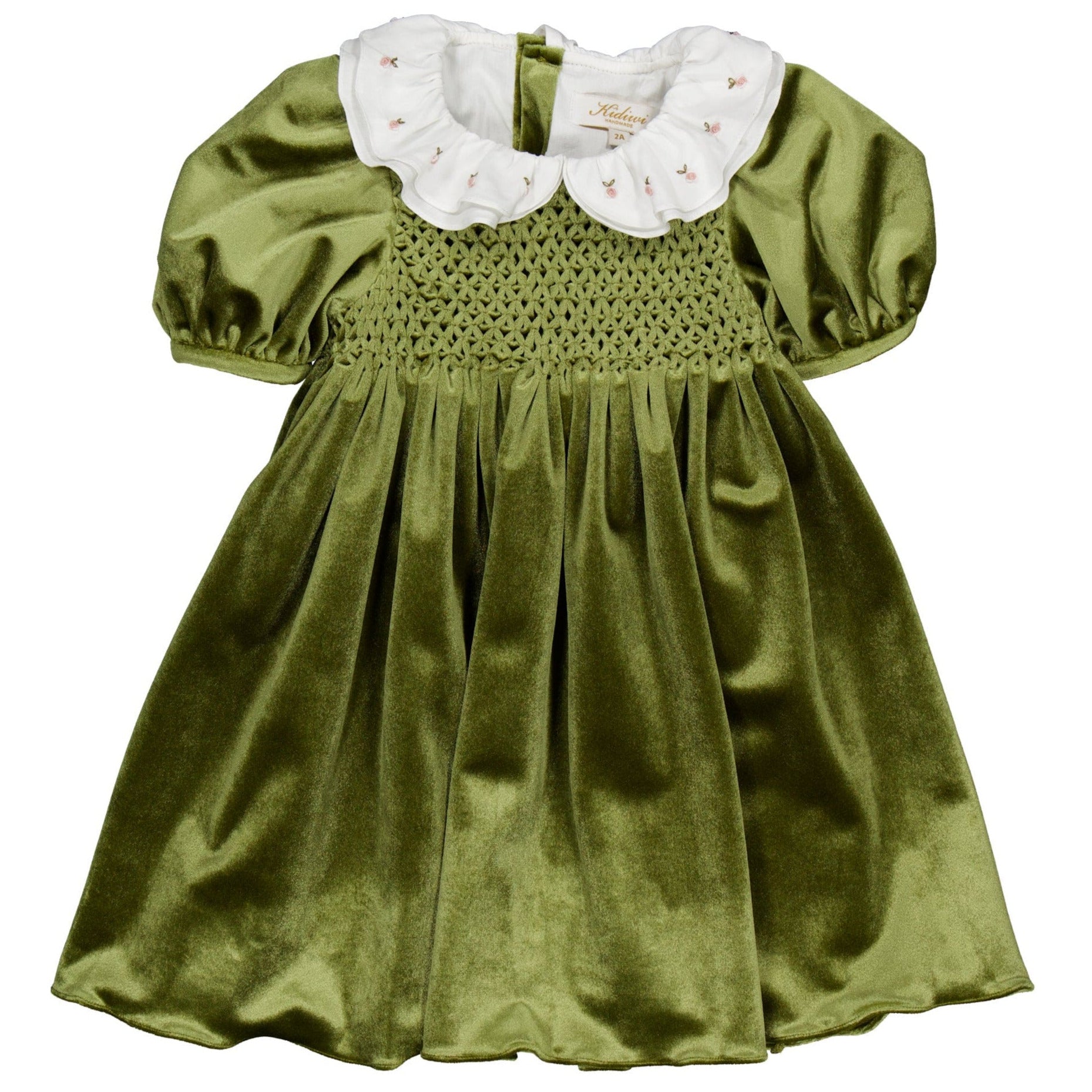 The Kidiwi Baby Girls' and Girls' Joséphine Smocked Dress is a green velvet toddler dress featuring puffed short sleeves, a smocked bodice, and a white scalloped embroidered collar with floral details.