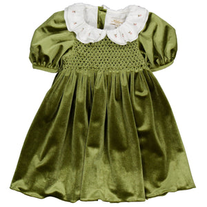 The Kidiwi Baby Girls' and Girls' Joséphine Smocked Dress is a green velvet toddler dress featuring puffed short sleeves, a smocked bodice, and a white scalloped embroidered collar with floral details.