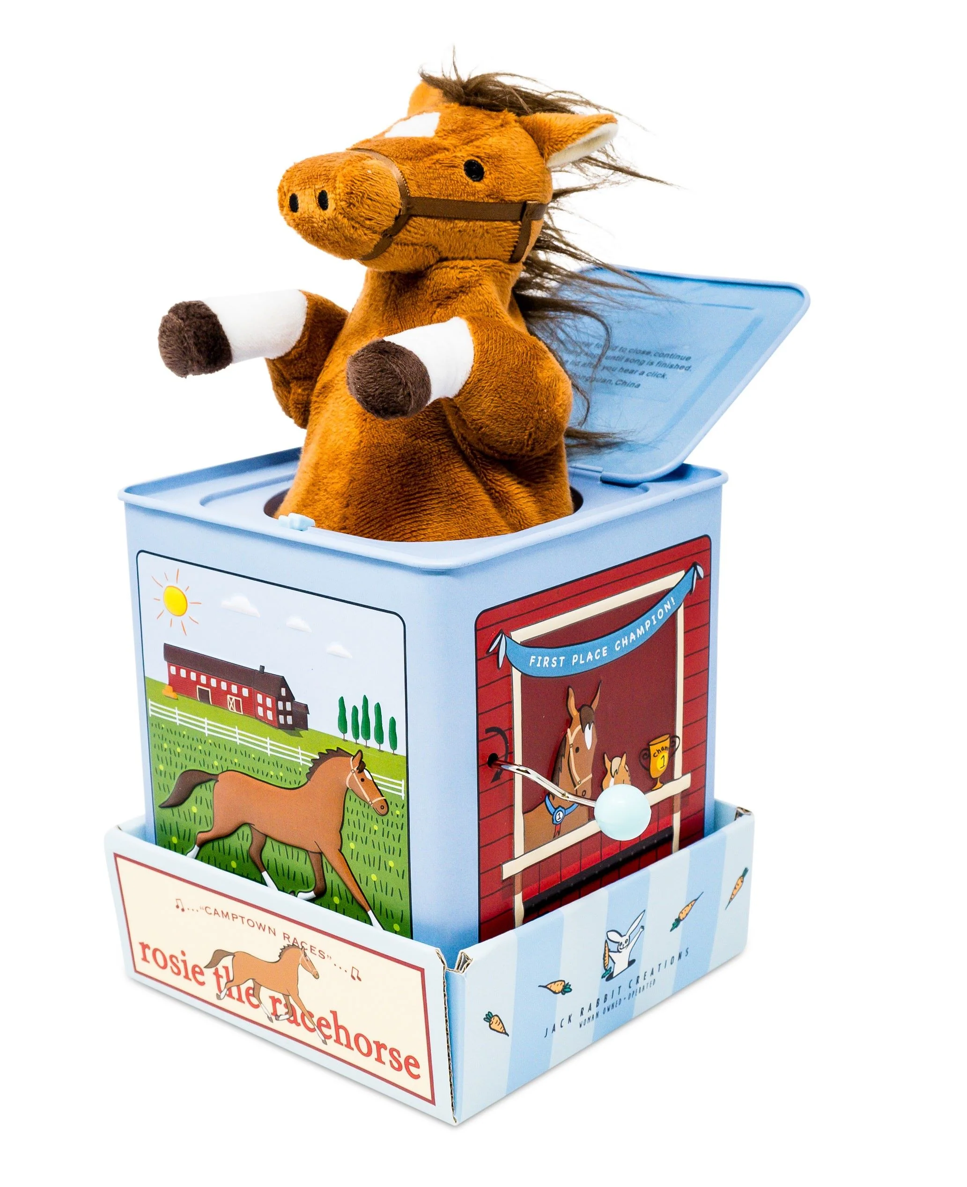 Enjoy a timeless classic with the Jack Rabbit Creations Jack-in-the-Box, featuring a plush horse character that pops out of a blue box adorned with delightful horse illustrations and labeled “rosie the racehorse.”.