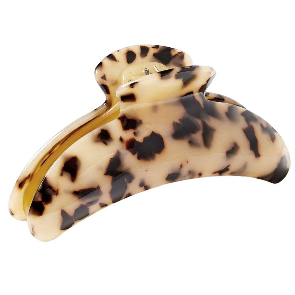 A Machete Jumbo Heirloom Claw hair clip with an open design, angled side view, crafted from Italian acetate, on a white background.