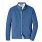 The Peter Millar Contour Jacket, by the brand Peter Millar, is a blue zip-up jacket made of flexible fabric, featuring a stand collar and two front pockets for comfort and style.