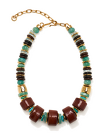 The Granada Necklace by Lizzie Fortunato features large brown beads, turquoise heishi, black, and gold accents, finished with a gold adjustable chain and clasp.