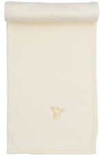 The Kissy Kissy Premier Giraffe Love Hand Emb. Striped Blanket is a cream-colored Pima cotton baby blanket featuring subtle stripes, rolled at one end and adorned with a small hand-embroidered giraffe near the corner.