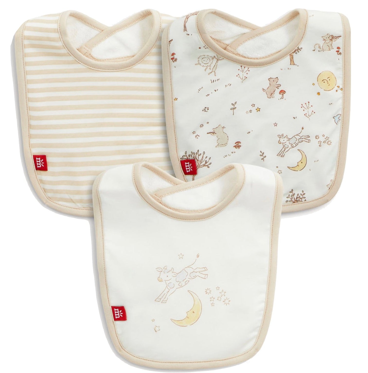 Introducing the Bedtime Rhymes Modal Bib 3-Pack by Magnetic Me: This set includes three absorbent baby bibs—one with beige stripes, one featuring animal and nature illustrations, and one showcasing a mouse on a moon. Each bib is crafted from soft, eco-friendly modal for gentle comfort and features beige trim with a red logo tag on the bottom left corner.