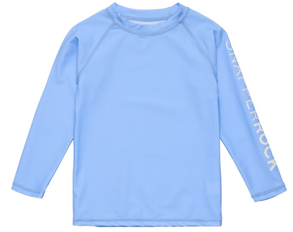 The Snapper Rock Boys' LS Rash Top in coastal blue features "SNAPPERROCK" in white on the left sleeve and is shown laid flat on a white background—a stylish pick for sun protection.