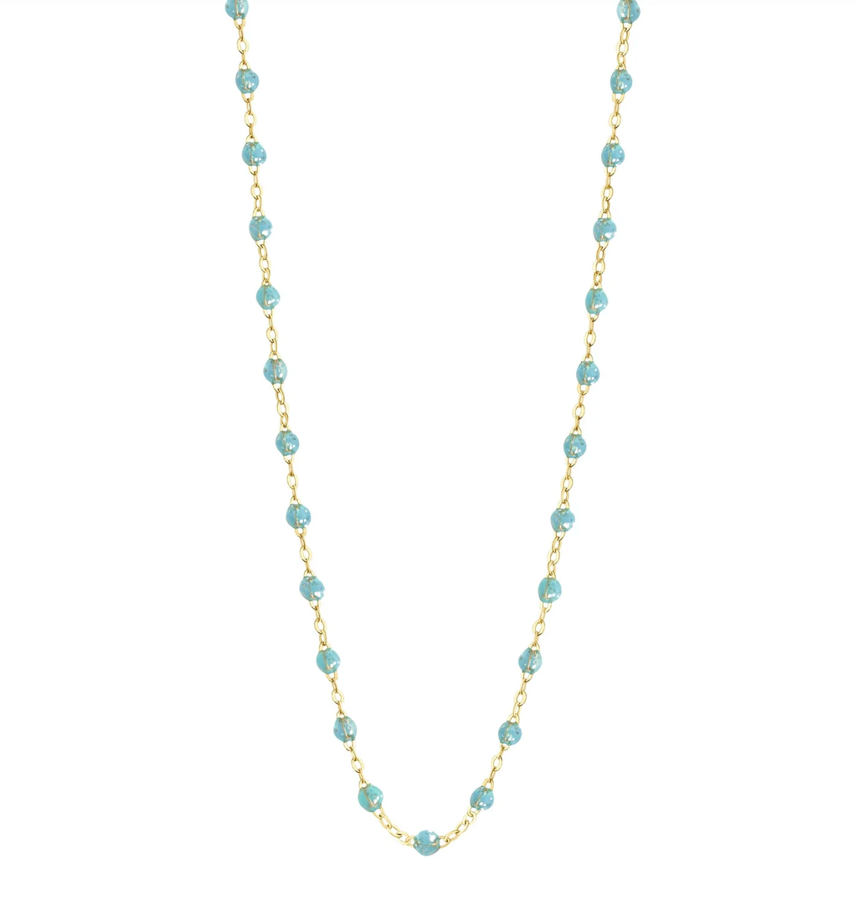 The Gigi Clozeau Classic Gigi Necklace 16.5" by Gigi Clozeau showcases an 18 carat yellow gold chain decorated with vibrant turquoise beads, creating a captivating piece of jewelry.