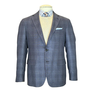 A mannequin wears the Canali Kei Blue/Grey Plaid Blazer, paired with a beige sweater, blue checkered shirt, patterned tie, and a light blue pocket square.