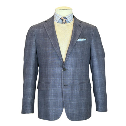 A mannequin wears the Canali Kei Blue/Grey Plaid Blazer, paired with a beige sweater, blue checkered shirt, patterned tie, and a light blue pocket square.