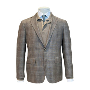The Kei Brown/Tan Plaid Blazer by Canali is displayed on a mannequin, layered over a beige sweater, crisp white dress shirt, and teal patterned tie.