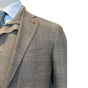 A mannequin wears the Canali Kei Brown/Tan Plaid Blazer, featuring structured tailoring, over a textured sweater, blue dress shirt, and patterned tie; shown from the chest up against a white background.