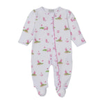 The Kissy Kissy Golf Championship Prt. Zip Footie is a soft Pima cotton baby onesie with long sleeves, featuring a playful pink and green golf print with carts, flags, and animals.
