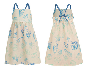 Front and back views of the Pepita & Me Girls' Isleno Dress, a cream summer dress with blue braided straps and blue seashell and starfish prints for a comfortable fit.