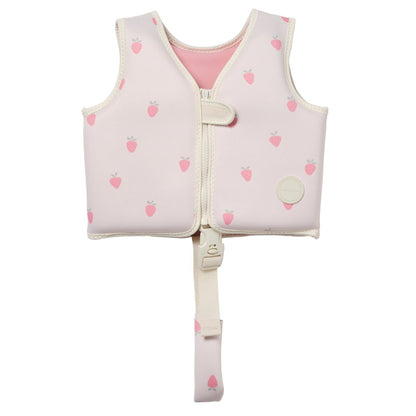The Sunnylife Kids' Swim Vest in light pink features small strawberry prints, a front zipper, velcro strap, and an anti-rise safety strap that fastens between the legs for a secure fit. It is designed with a neoprene comfort guard to keep your child comfortable while swimming.